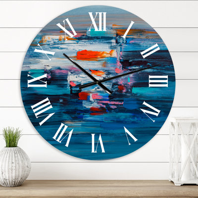 Vagues de rouge sur un océan bleu foncé - horloge murale moderne