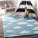 Tapis touffeté à la main à motif nuageux bleu Sachiko Abbas