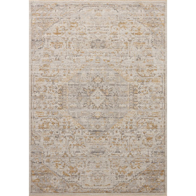 Tapis ivoire / ocre Loloi Forlini