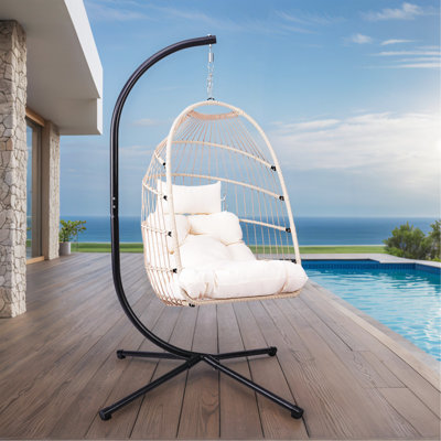 Fauteuil à œufs suspendu pliable avec support et coussin, rotin en PEHD et structure en aluminium-acier robuste, fauteuil à balançoire extérieur en osier avec appui-tête et coussin (beige)