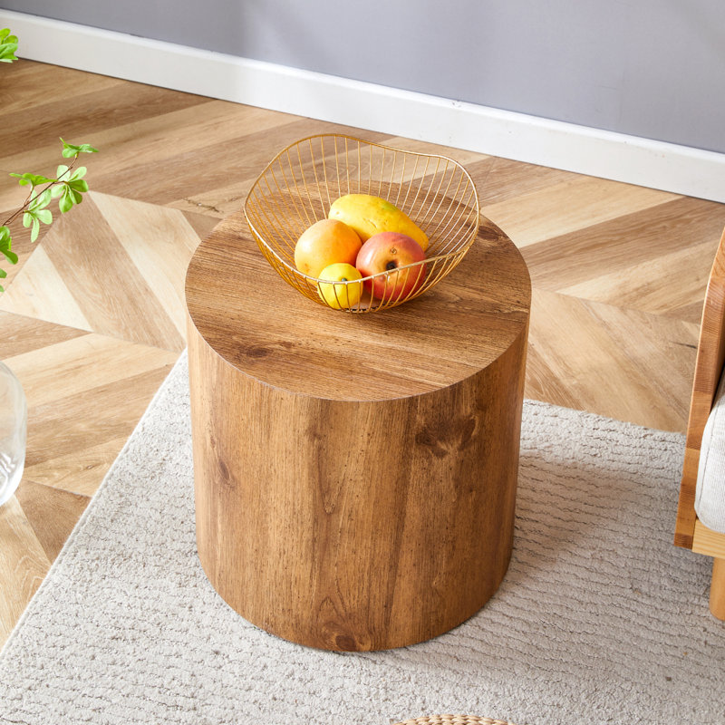 La table cylindrique avec son motif peut être facilement intégrée dans une variété de styles d'intérieur