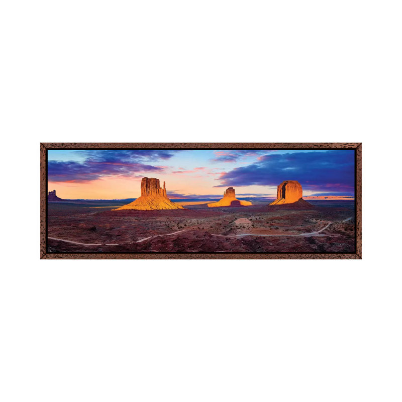 Sunset Monument Valley by Susanne Kremer - Panoramic Print on Canvas, 30.48 cm H x 91.44 cm W, Classic Brown Wood Framed