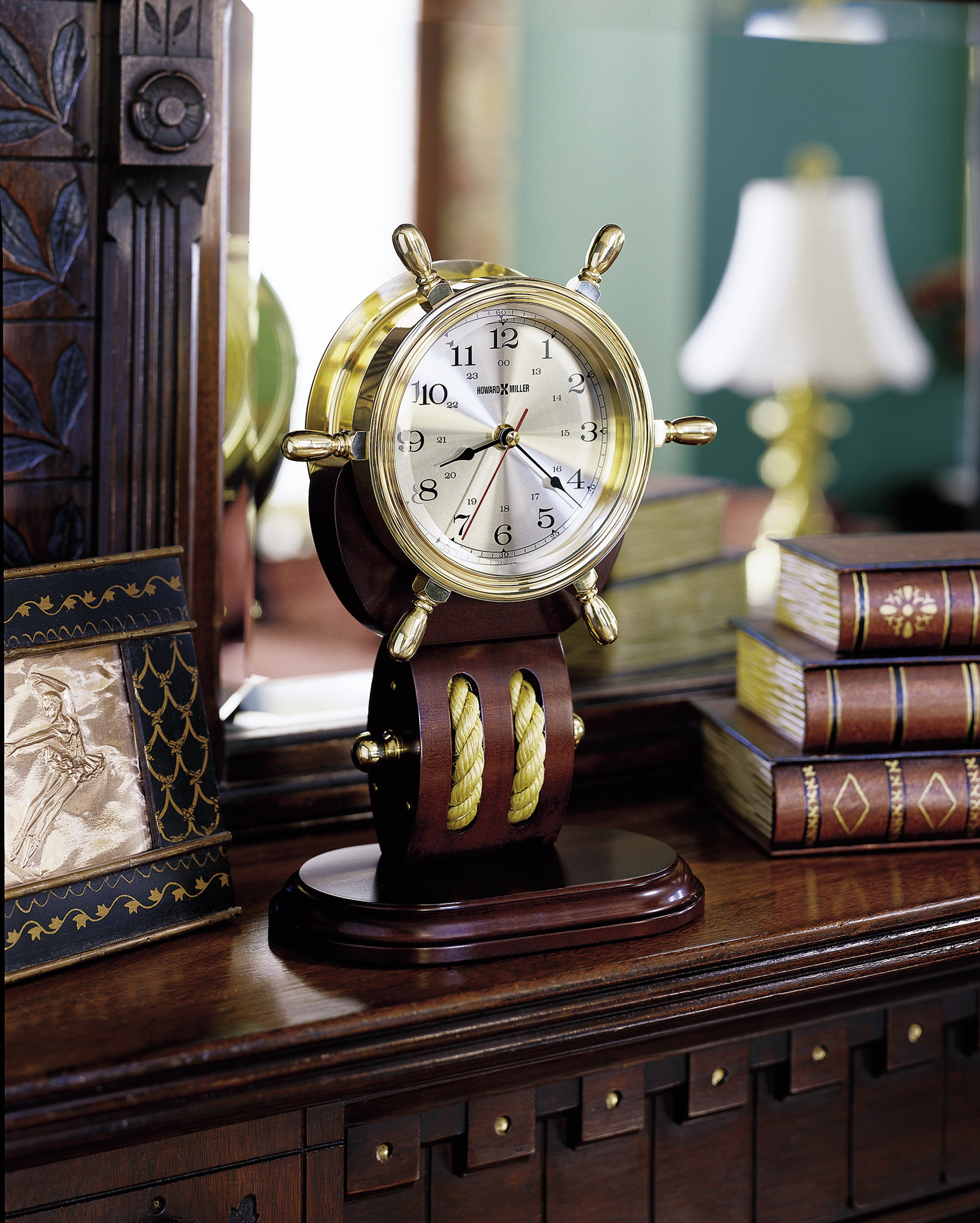 Howard Miller Weather And Maritime Coastal Analog Mahogany Quartz Tabletop  Clock in Brown/Polished Brass