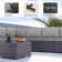 Yasmina 9-Piece Rattan Sectional Seating Group with Cushions And Tempered Glass Table