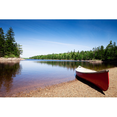 Canoe on Lake Shore by Jwebb