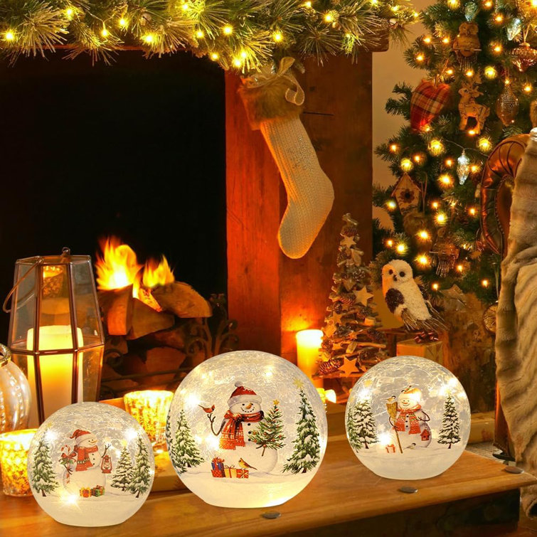 https://assets.wfcdn.com/im/04532091/resize-h755-w755%5Ecompr-r85/2585/258529674/Christmas+Decorations+Indoor%2C+Set+Of+3+Crackle+Glass+Ball+With+LED+Lights+Christmas+Snowman+Home+Decor%2C+Christmas+Table+Decorations+Lighted+Globes+With+Timer+For+Mantel+Fireplace+Tabletop.jpg