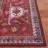 Gullion Southwestern Navy/Rust Area Rug-1746432609