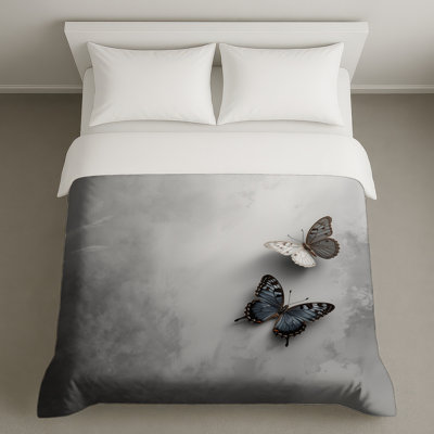 Deux papillons sur la housse de couette