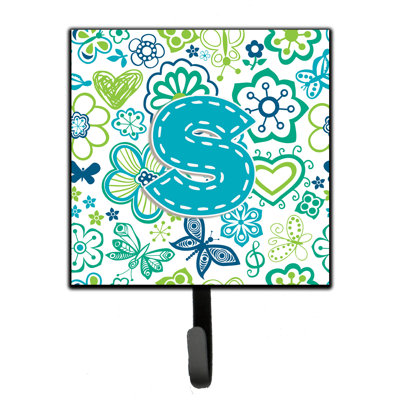 Crochet mural fleurs et papillons