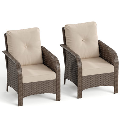 Two Woven Rattan Outdoor Single Chairs