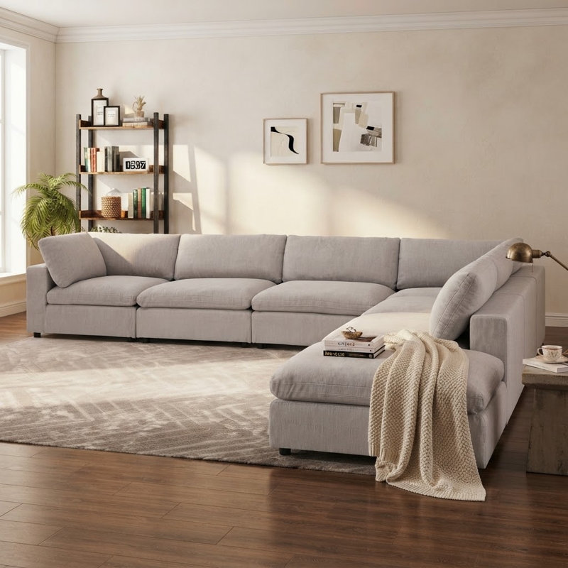 Canapé modulaire rembourré avec repose-pieds 7 pièces Nuccio, Gris clair