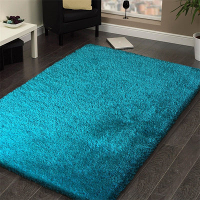 Huya Hand-Tufted Turquoise Shag Area Rug