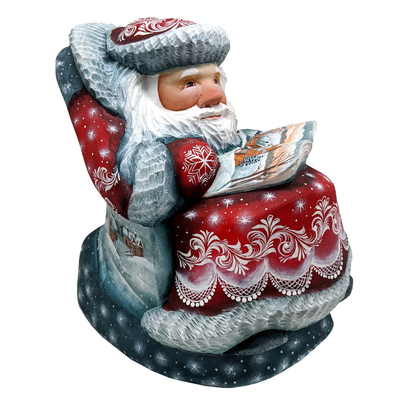 Figurine chef-d'œuvre de père Noël en bois sculpté au repos