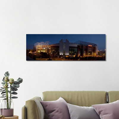Football Stadium Lit up at Night, Old Trafford, Greater Manchester, England 1 Piece Wrapped Canvas Panoramic Wall Art