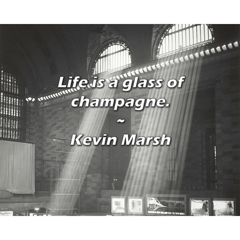 Citation de Kevin Marsh: La vie est une coupe de champagne.