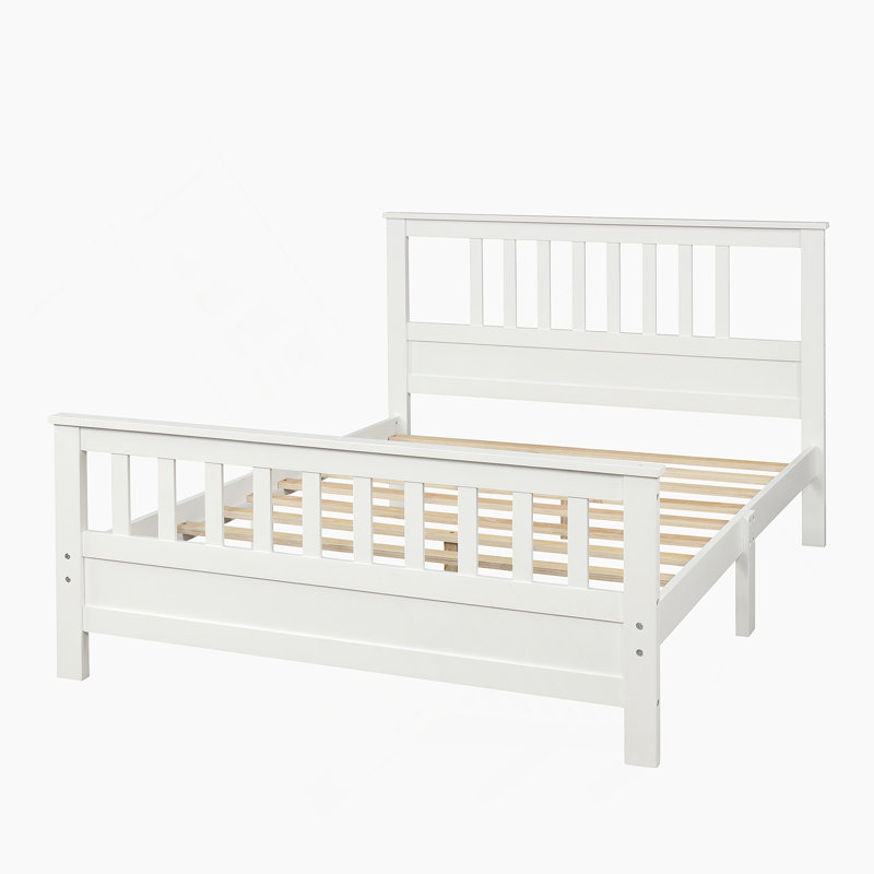 Lit plateforme en bois avec tête et pied de lit