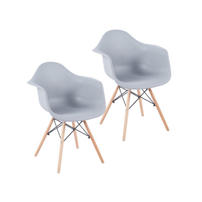 Chaise de salle à manger en plastique Hermina avec pieds en bois de hêtre
