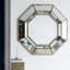 Miroir octogonal surdimensionné argenté