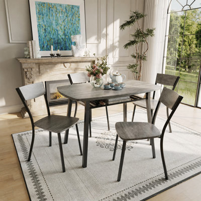 Ensemble de table de salle à manger pour 4 personnes avec support de rangement intégré, chaises à dossier trapézoïdal, ensemble de 4 tables de cuisine en MDF de 43,3 pouces et 4 chaises, peu encombrantes pour les petits appartements, coins arrondis