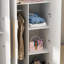 Armoire en bois manufacturé à 4 portes Bernistine-408165673