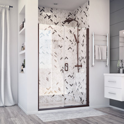 Porte de douche à charnière de luxe l 44 po x H 71,375 po et panneau intégré en bronze huilé Deluxe