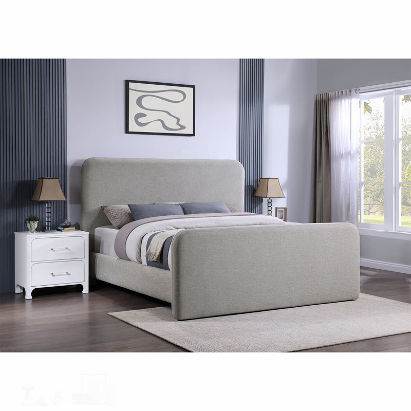 Très grand lit plateforme tapissier chic gris avec coins arrondis et rembourrage moelleux pour un confort moderne