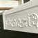 St. Ives 33" Front Apron Fireclay Sink with an Vine Design and Beveled on the Opposite Side