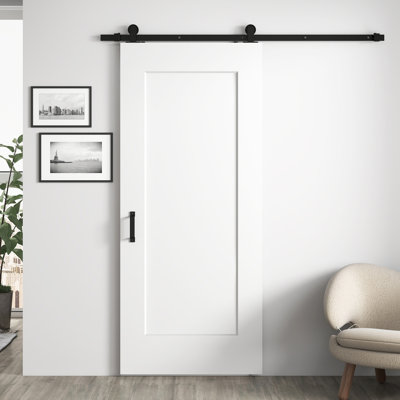 Porte de grange coulissante 36 po x 84 po à 1 panneau et base blanche avec ensemble de quincaillerie d'installation et une poignée noire matte (panneau de porte pré-assemblé
