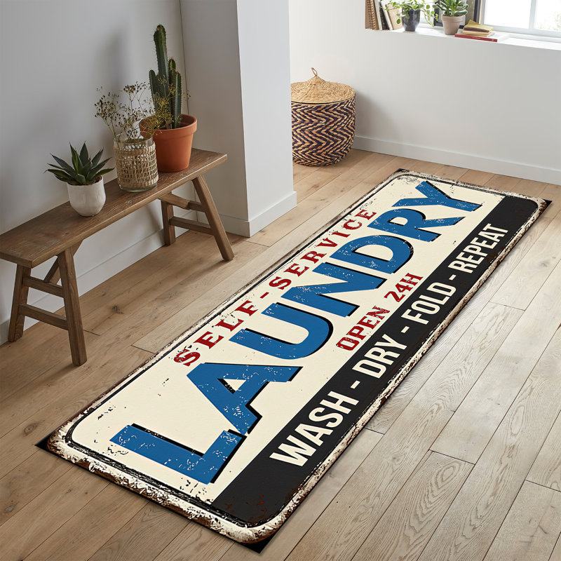 Tapis non tissé à motif mince avec un motif géométrique distinctif dans des tons de terre, parfait pour ajouter une touche d'élégance à n'importe quelle pièce