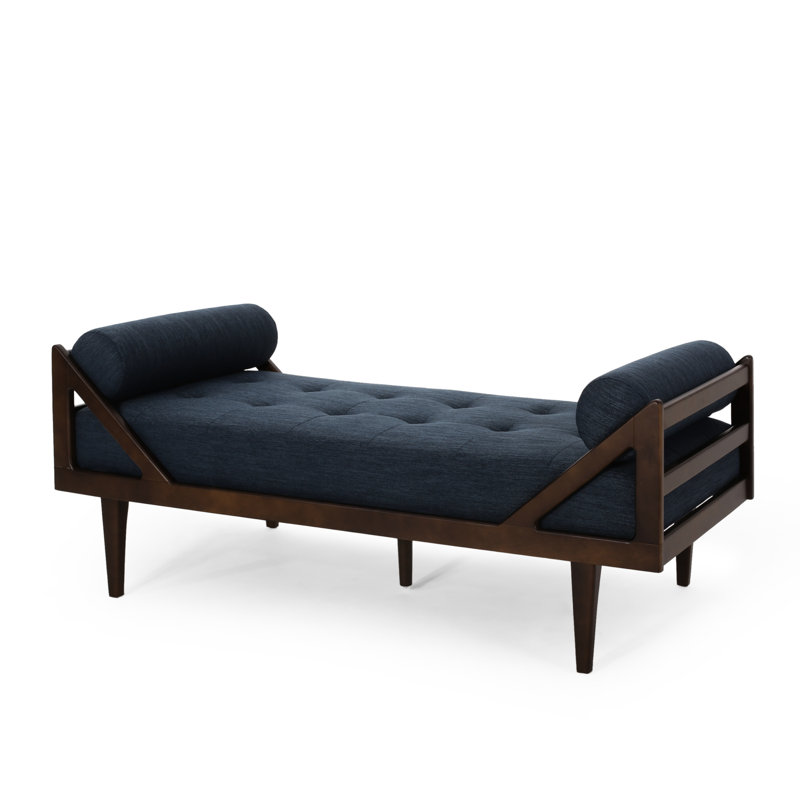 Chaise longue en tissu bleu marine: une retraite élégante et confortable avec un capitonnage contemporain