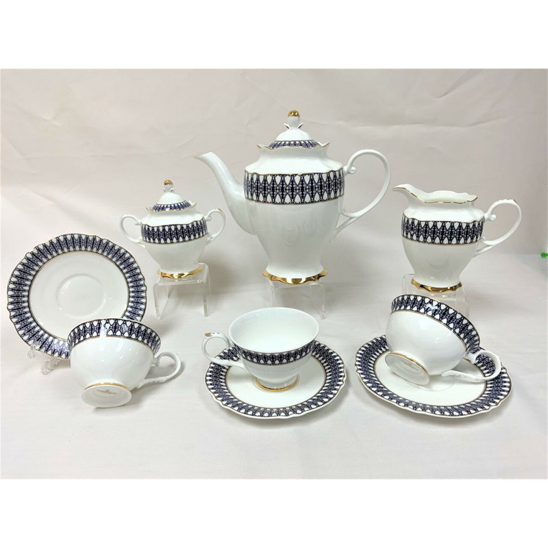 Ensemble de 15 théières à motif bleu avec garniture dorée