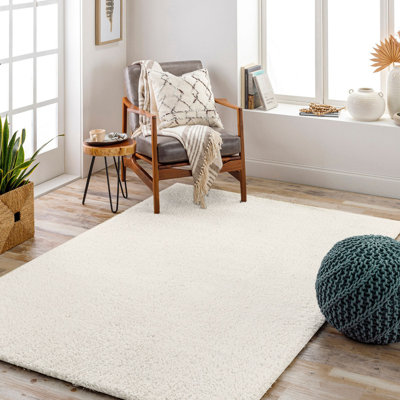 Blannie Machine Tufted Area Rug