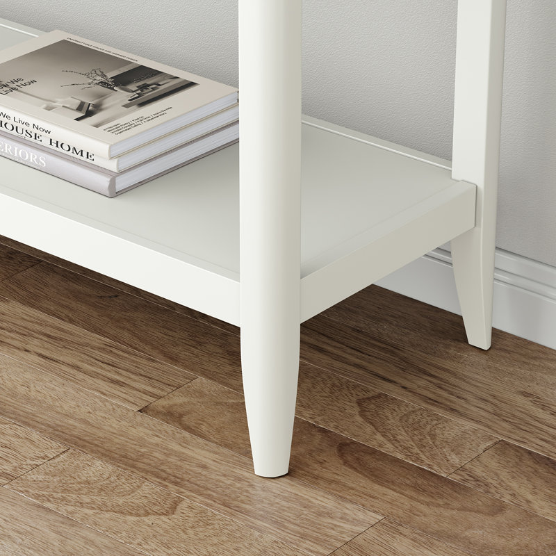 Console d'entrée avec deux tiroirs, canapé de style moderne Mid-Century derrière le canapé avec pieds en bois massif