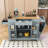 Rolling Kitchen Island Cart with Built-in Power Outlet, Storage Cabient and Trash Can-2116294576