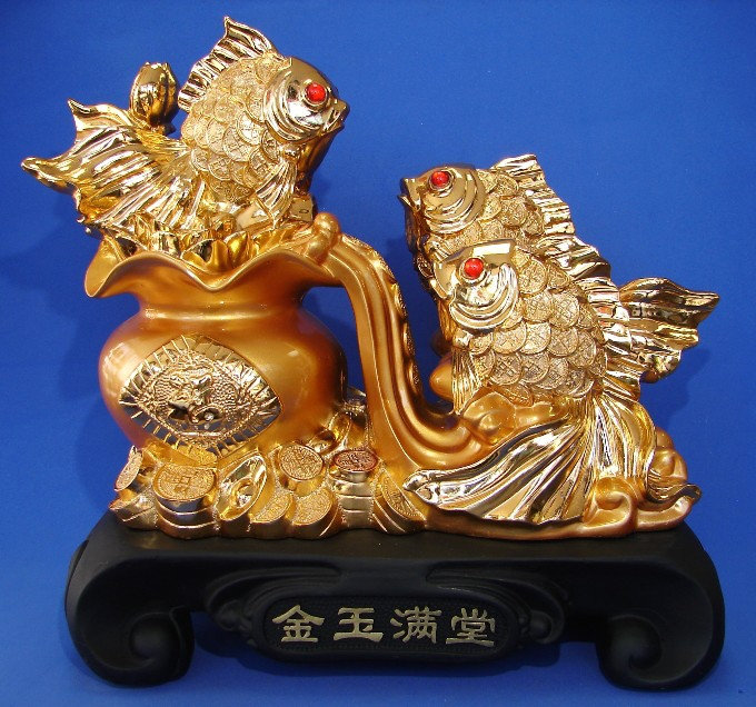 Figurine poisson rouge représentant la richesse