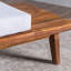 Canapé modulaire en bois avec coussins Bynum-25968498