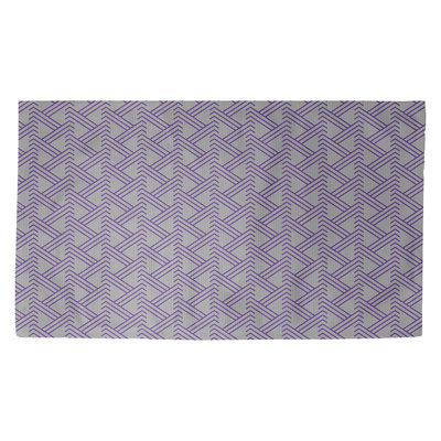 Tapis mauve à motif de zigzags