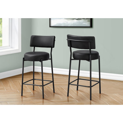 Ensemble de 2 tabourets contemporains en similicuir noir avec dossier incurvé et structure en métal robuste pour une assise confortable