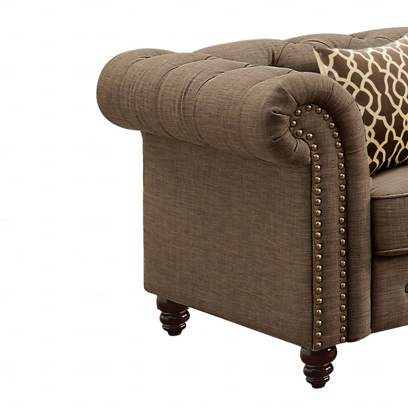 Fauteuil d'appoint brun capitonné avec coussin