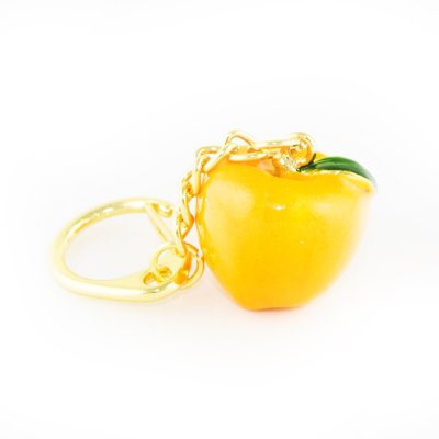 Chaîne de porte en amulette de pomme de paix dorée