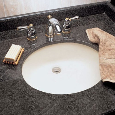 American Standard " Oval Bathroom Sink and Overflow Hole