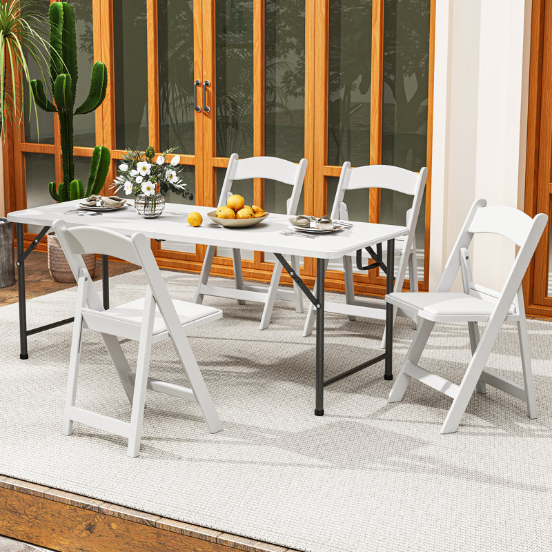 Chaises empilables pliantes en résine blanche avec siège rembourré (ensemble de 4)