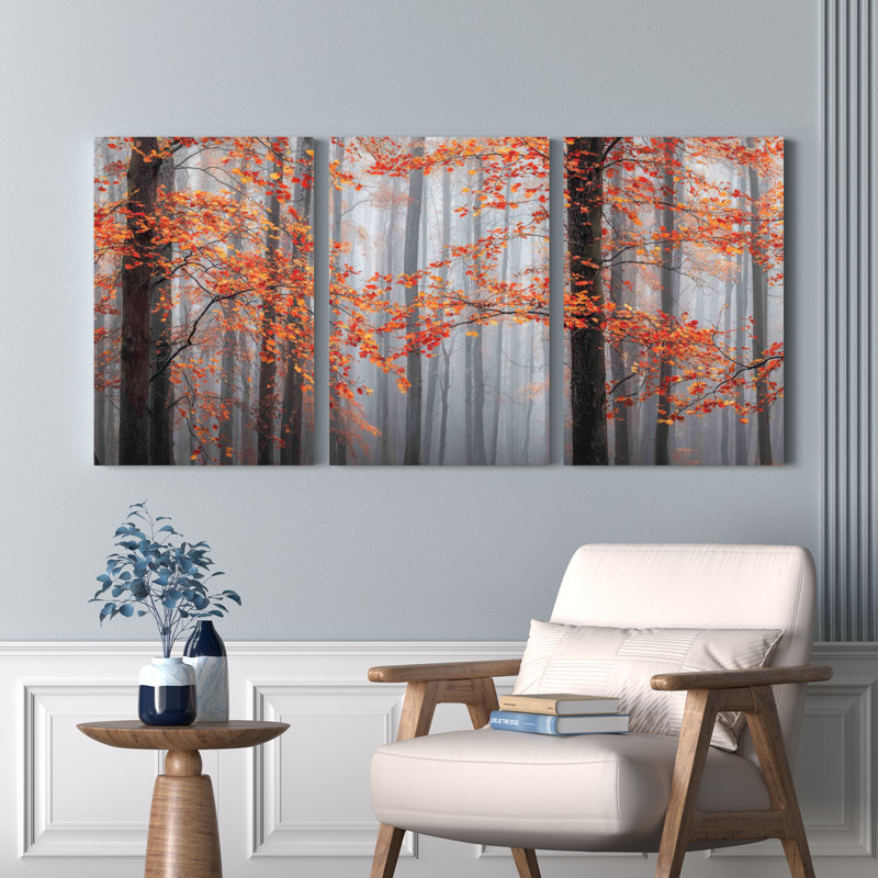 Ensemble de 3 tableaux sur toile tendue représentant une forêt d'automne aux feuilles orangées, idéal pour décorer le salon, la chambre ou la maison.