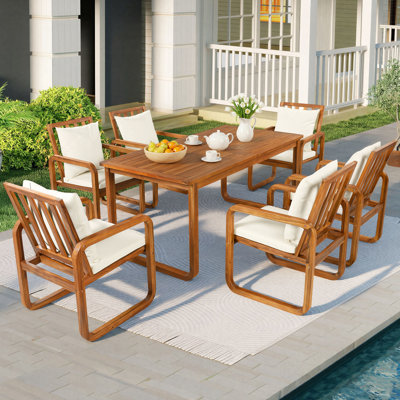 Ensemble repas pour 6 personnes en bois d'acacia avec table rectangulaire et coussins inclus
