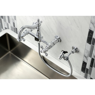Kingston Brass Heritage Double-Handle 3-Hole Wall-Mount Bridge Kitchen Faucet with Brass Sprayer