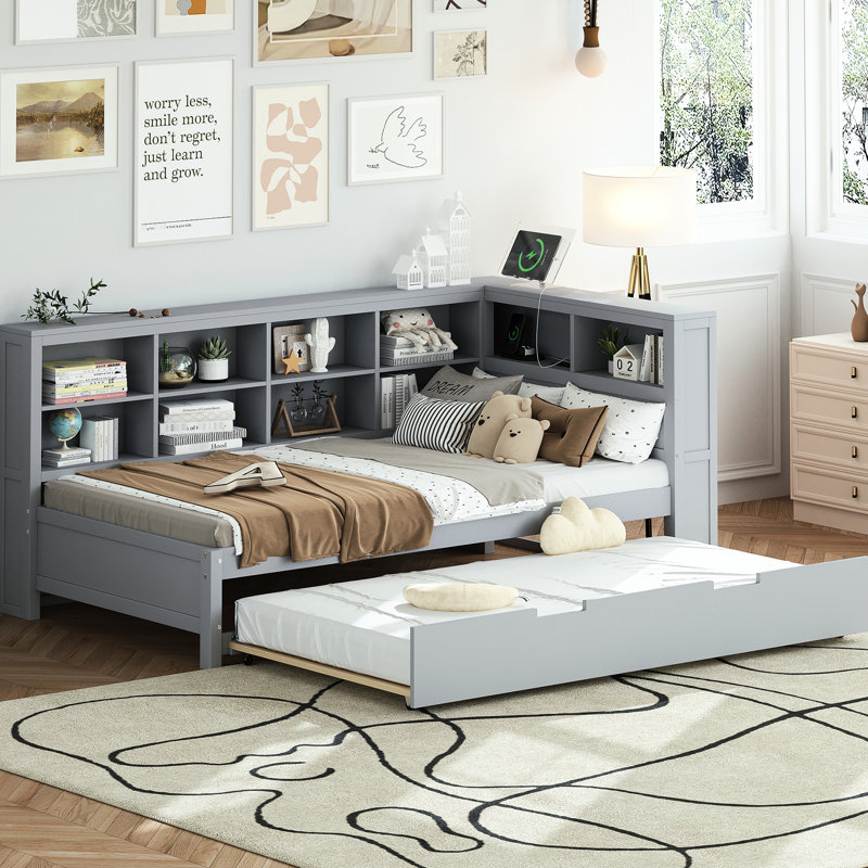 Lit de jour simple avec lit gigogne, rangement gris, zone de chargement et tablette de rangement
