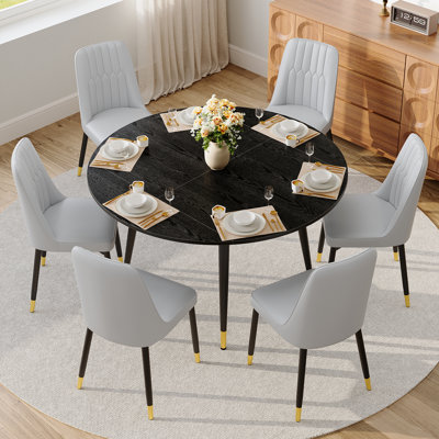 Ensemble de table de salle à manger extensible de 53 po pour 6, 7 pièces Table de cuisine ronde à ovale avec 6 chaises en similicuir et pieds dorés pour les petits espaces