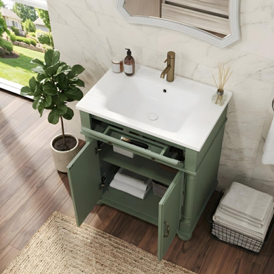Meuble-lavabo 28 po avec lavabo en céramique, portes à fermeture douce et tablettes réglables