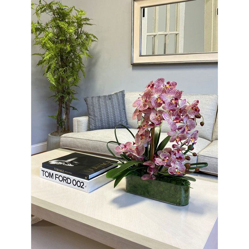 Arrangement floral orchidée dans un vase