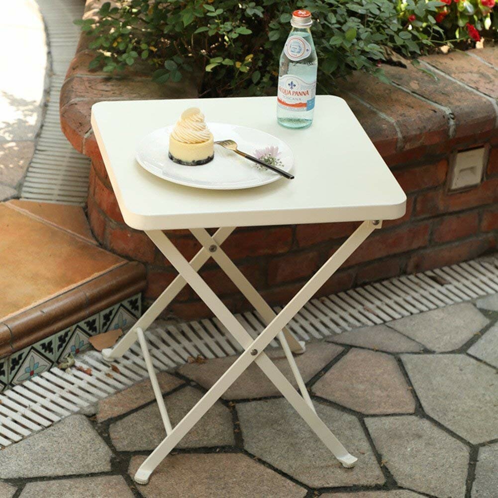 folding metal bistro table        
        <figure class=